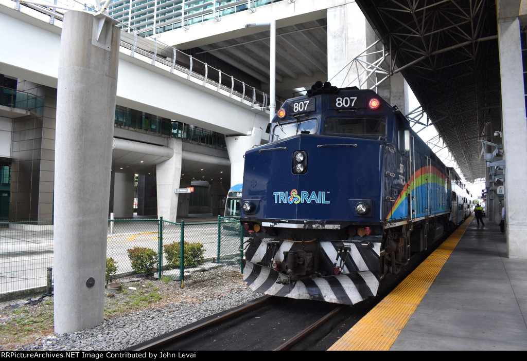 F40PH-3C # 807 on the point of a Tri-Rail train between assignments at Miami Airport Station